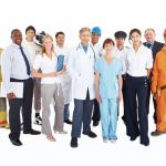Portrait of people from different professions standing together on white